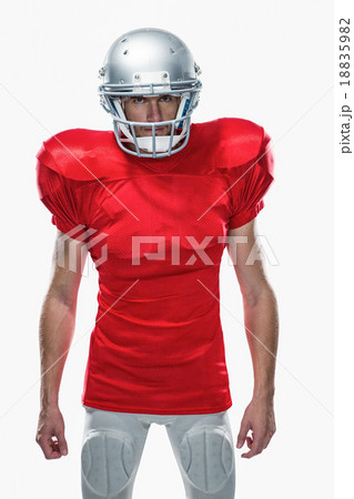 Portrait of American football player standing Portrait of American football player standing 18835982