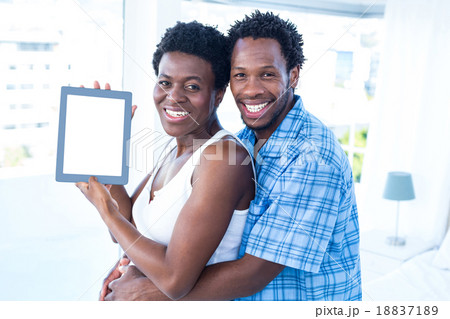 Portrait of happy couple embracing Portrait of happy couple embracing 18837189