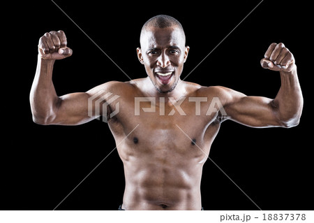 Portrait of happy shirtless athlete cheering Portrait of happy shirtless athlete cheering 18837378