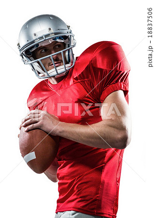 American football player in red jersey throwing the ball American football player in red jersey throwing the ball 18837506