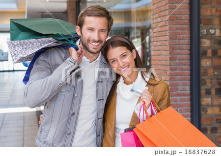 Young couple smiling while walking 18837628