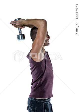 Profile view of athlete working out with dumbbells Profile view of athlete working out with dumbbells 18837974