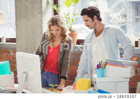 Business people working on computer in office Business people working on computer in office 18839107