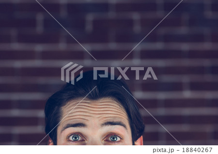 Portrait of man with raised eyebrows Portrait of man with raised eyebrows 18840267