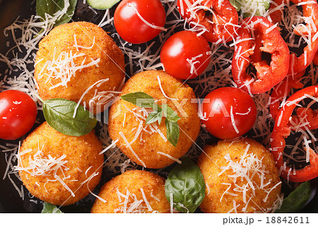 rice balls and salad of fresh vegetables macro 18842611