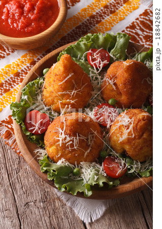 rice balls stuffed with meat and tomato sauce rice balls stuffed with meat and tomato sauce 18842682