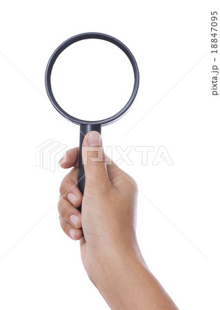 Hand holding magnifying glass isolated on white ba Hand holding magnifying glass isolated on white ba 18847095