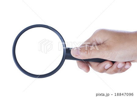Hand holding magnifying glass isolated on white ba Hand holding magnifying glass isolated on white ba 18847096