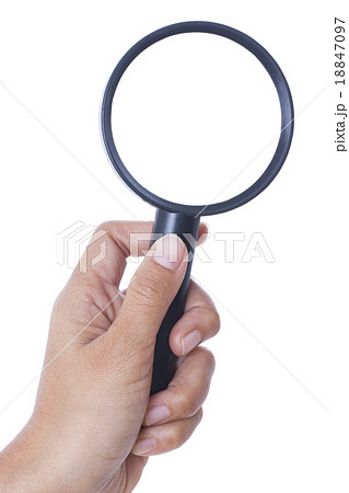 Hand holding magnifying glass isolated on white ba Hand holding magnifying glass isolated on white ba 18847097