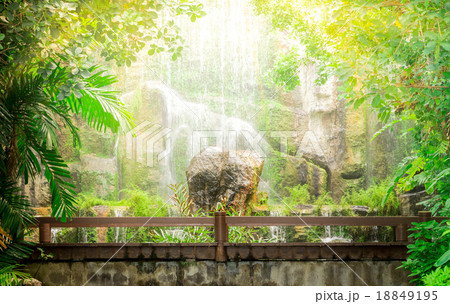 Wooden Bridge With Beautiful Waterfall In Background Wooden Bridge With Beautiful Waterfall In Background 18849195