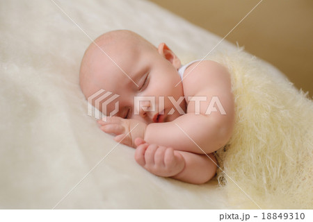 Little baby on the bed at home Little baby on the bed at home 18849310