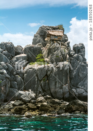 Hut on stone 18850268