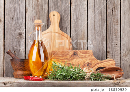 Kitchen cooking utensils and spices on shelf 18850929