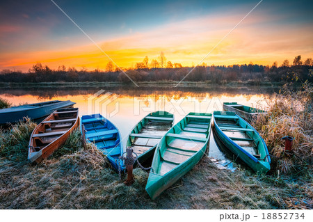 Lake, River and old wooden rowing fishing boat at 18852734