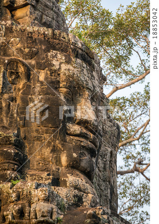 Stone face on the towers of ancient Bayon Temple Stone face on the towers of ancient Bayon Temple 18853042