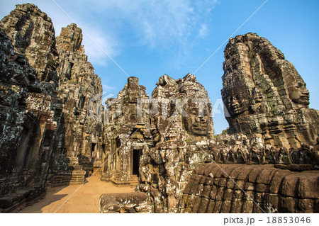 Stone faces on the towers of ancient Bayon Temple 18853046