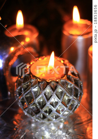Candles and New Year's toys on a black background 18853656