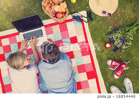 Seniors lying on a blanket 18854440