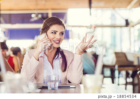Businesswoman in cafe Businesswoman in cafe 18854534
