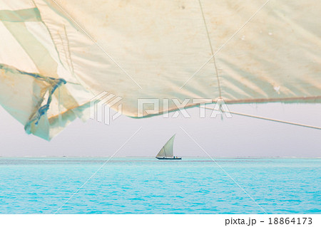 Traditional wooden sailboat sailing on horizon. Traditional wooden sailboat sailing on horizon. 18864173
