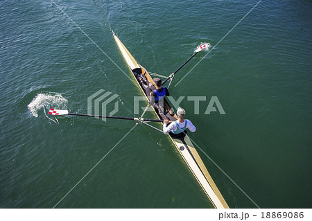 Two Men paddling 18869086