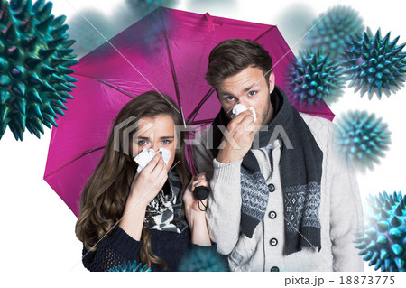 Composite image of couple blowing nose while holding umbrella 18873775