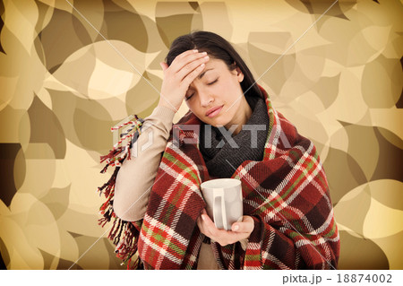 Composite image of sick woman having a migraine 18874002