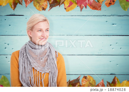 Composite image of smiling woman wearing a scarf Composite image of smiling woman wearing a scarf 18874028