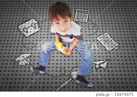 Composite image of cute boy sitting with building blocks Composite image of cute boy sitting with building blocks 18874075