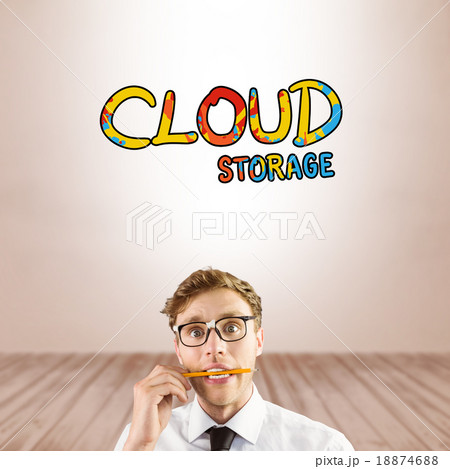 Composite image of geeky businessman biting a pencil 18874688