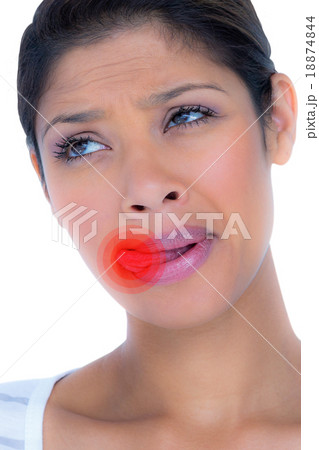 Composite image of beautiful woman licking lips while looking aw Composite image of beautiful woman licking lips while looking aw 18874844
