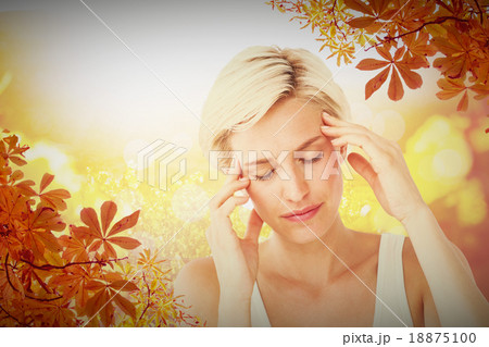 Composite image of pretty blonde with headache touching her temp Composite image of pretty blonde with headache touching her temp 18875100