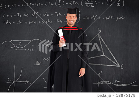 Composite image of charming graduate boy with his diploma Composite image of charming graduate boy with his diploma 18875179