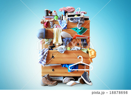 Mess, dresser with scattered clothes 18878698