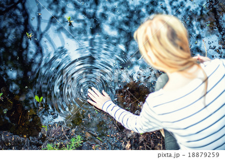 Girl near the water 18879259