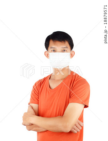 Asian man wearing a face mask Asian man wearing a face mask 18879571