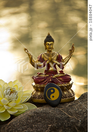 Buddha statue with the Yin & Yang Sign Buddha statue with the Yin & Yang Sign 18884047
