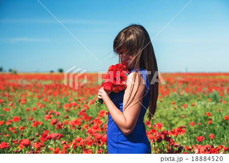 Girl with poppies 18884520