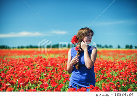 Girl with poppies Girl with poppies 18884534