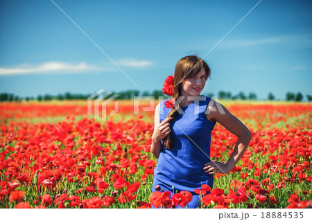 Girl with poppies Girl with poppies 18884535