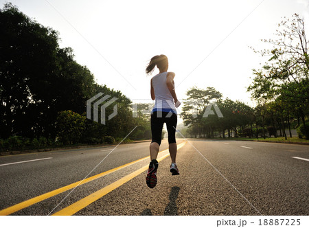 Runner athlete running at road. Runner athlete running at road. 18887225