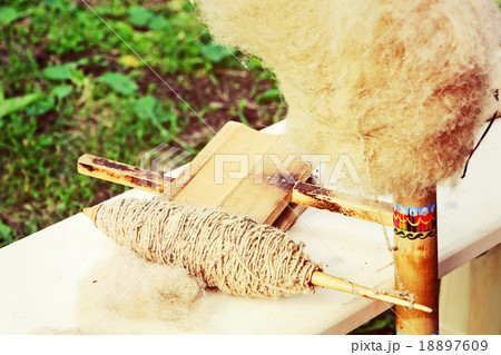 Old wooden spindle. Old wooden spindle. 18897609