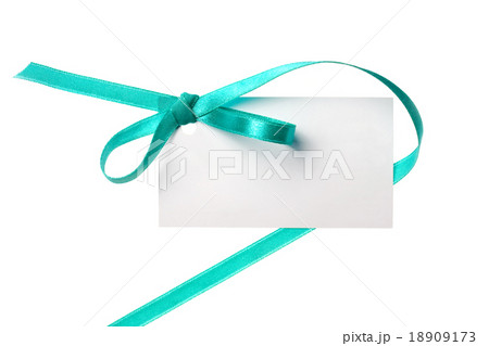 Blank gift tag tied with a bow satin ribbon Blank gift tag tied with a bow satin ribbon 18909173