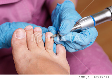 Chiropody Spa salon. Shaping nails and cuticles. 18915713