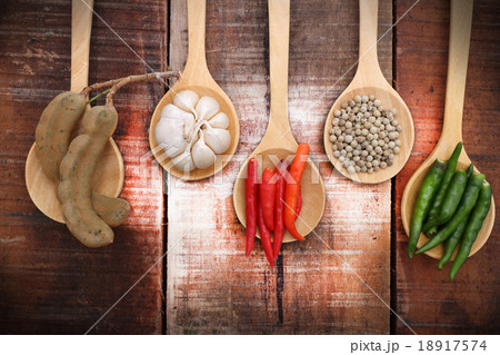 Spices and herbs in wooden spoons. Spices and herbs in wooden spoons. 18917574
