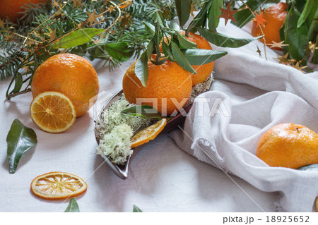 Tangerines (clementines) in Christmas decor Tangerines (clementines) in Christmas decor 18925652