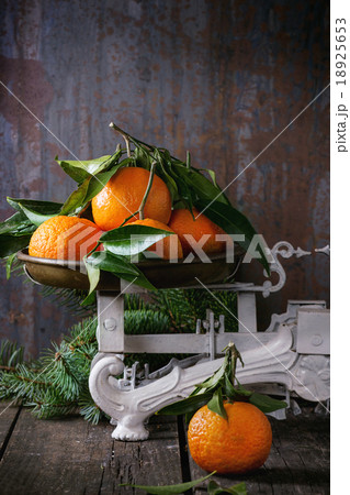 Tangerines on scales Tangerines on scales 18925653