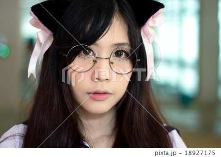 Asian school girl with charming eyes Asian school girl with charming eyes 18927175