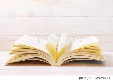Open Book with heart shape in the middle page 18929813