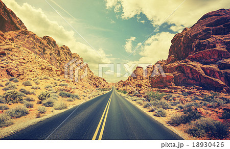Retro stylized desert highway. 18930426